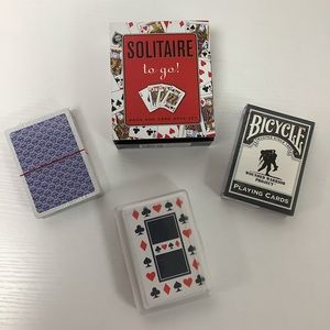 Bundle of assorted playing cards. NWOT